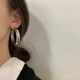 Simple Metal Texture With Large Individual Earrings – Thoughtful Gifts — 1