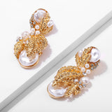 Alloy gold leaf earrings – Thoughtful Gifts — 4