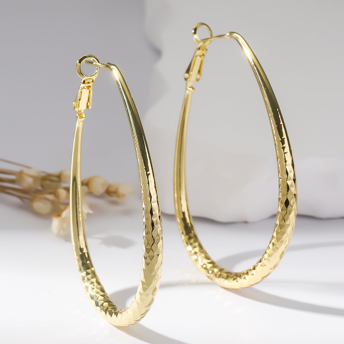 Golden Glossy Spring Fastener Egg-shaped Earrings – Thoughtful Gifts — 1