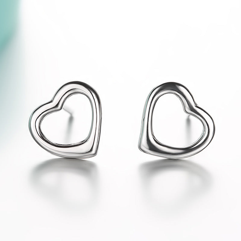 Fashion Version Hollow Heart Shape Stud Earrings – Stylish Gifts — 1
