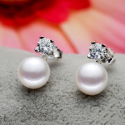 Round pearl stud earrings – Practical Gifts — 1