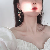 Fourleaf Grass Flower Ring Tassel Earrings – Stylish Gifts — 1