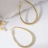 Golden Glossy Spring Fastener Egg-shaped Earrings – Thoughtful Gifts — 3