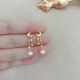 Design Sensation Meteor Shower Stud Earrings Natural – Useful Gifts — 1