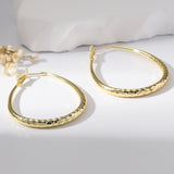Golden Glossy Spring Fastener Egg-shaped Earrings – Thoughtful Gifts — 4