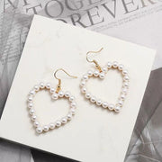 Women's Sweet Temperament Hollow Peach Heart Earrings – Gifts for Her — 1