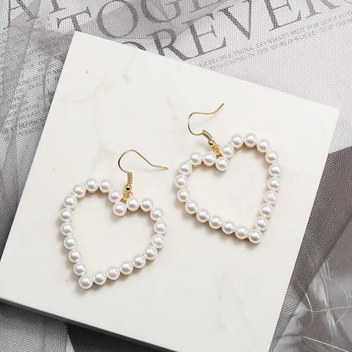 Women's Sweet Temperament Hollow Peach Heart Earrings – Gifts for Her — 1