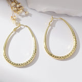 Golden Glossy Spring Fastener Egg-shaped Earrings – Thoughtful Gifts — 5