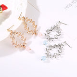 Fashion Creative Geometric Hollow Leaves Stud Earrings – Stylish Gifts — 1