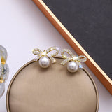 Women's Elegant Bow Shape Pearl Earrings – Gifts for Her — 1