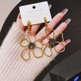 Retro Easy Matching Hollow Flower Earrings – Useful Gifts — 1